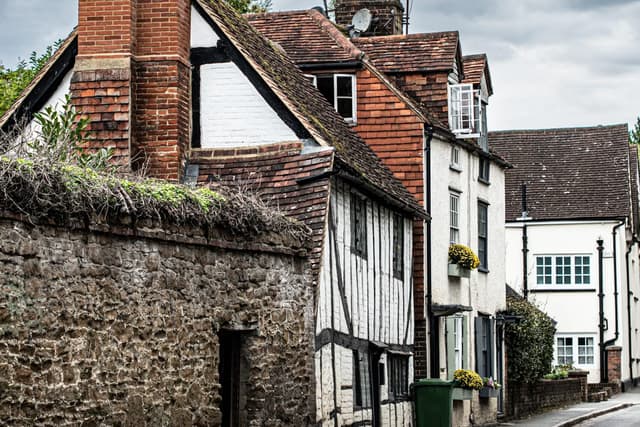 Traditional timber-framed houses on a village street in southern England